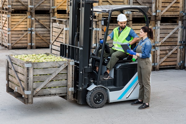 Battery electric forklifts in warehouse